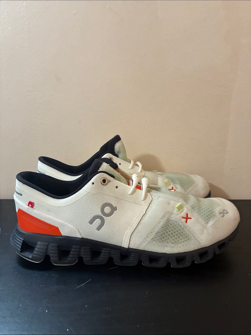 On Cloud X 3 sneakers in the Ivory and Flame colorway size 9 Men’s